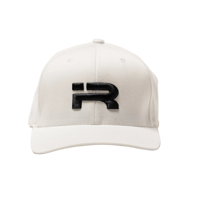 A white structured baseball cap with a black raised 'R' logo on the front, photographed against a clean off-white background.