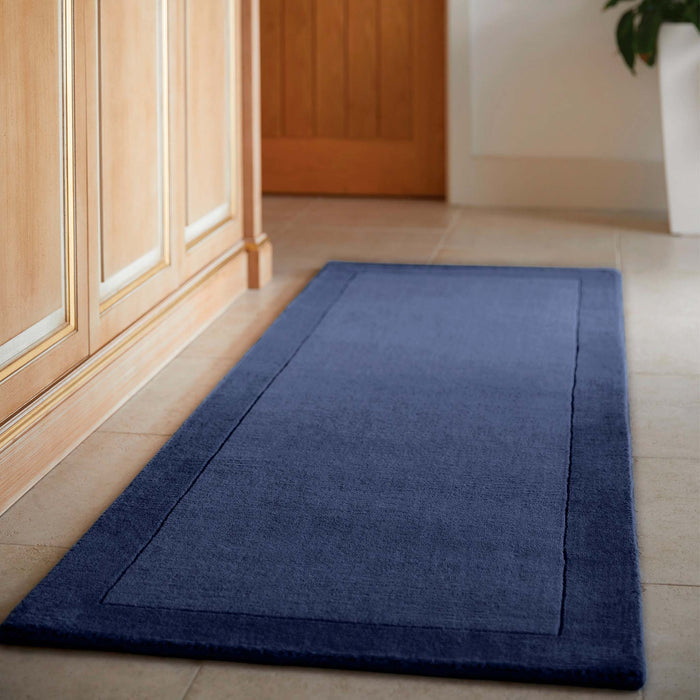 Borders Navy Blue 100% wool runner with a two-tone border design.
