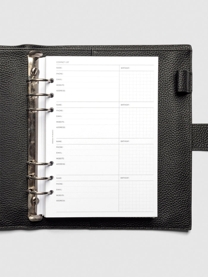 Refreshed Contact List Planner Inserts styled inside a black leather agenda.