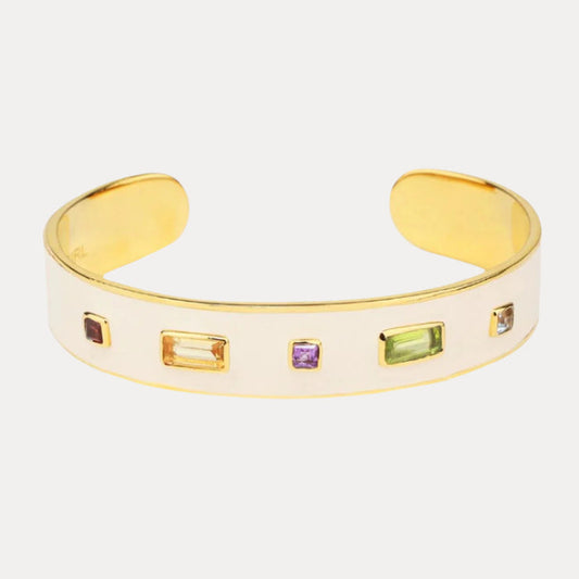 a white and gold bracelet with multicolored stones