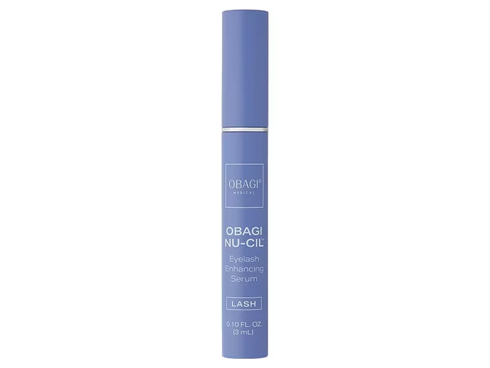 A tube of Obagi Nu-cil Eyelash Enhancing Serum with blue and white packaging.