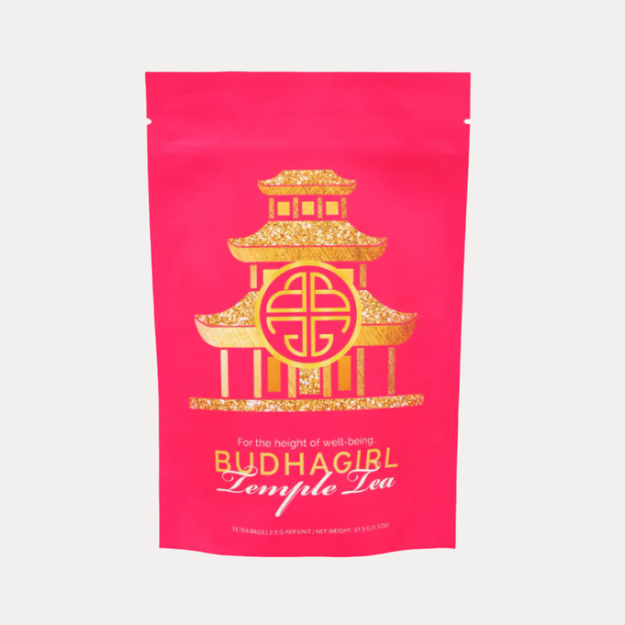 a pink bag with gold text