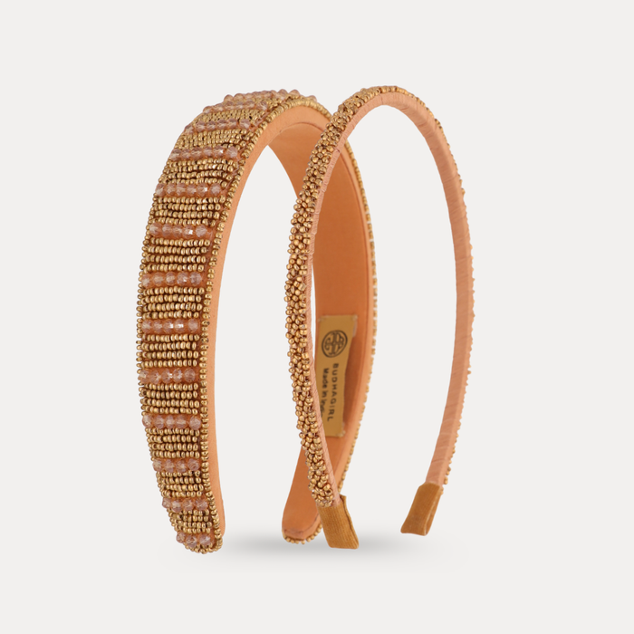 a pair of headbands with beads