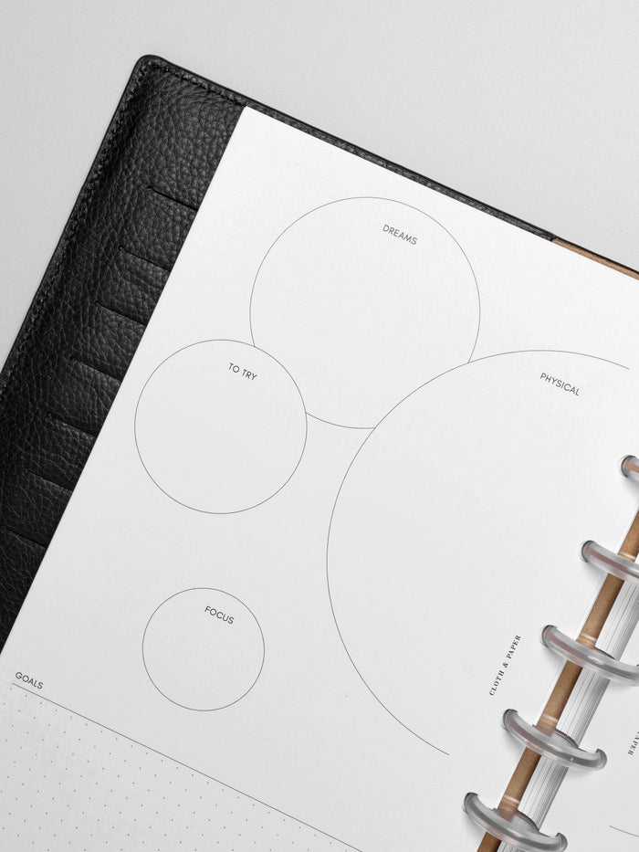 Insert in use inside a black leather planner.